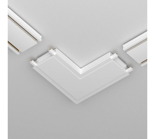 Соединитель угловой L-образный для треков накладных Maytoni Accessories for tracks Radity TRA084CL-11W